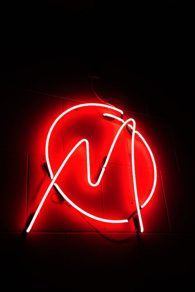 A red neon logo light for LED neon vs glass neon