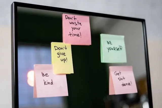 sticky notes on a mirror for who invented post-it notes