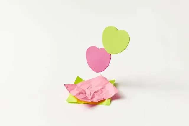 paper hearts on a wall for sticky note heart