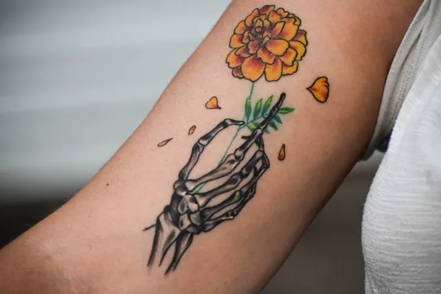 a tattoo on an arm for how to apply temporary tattoo