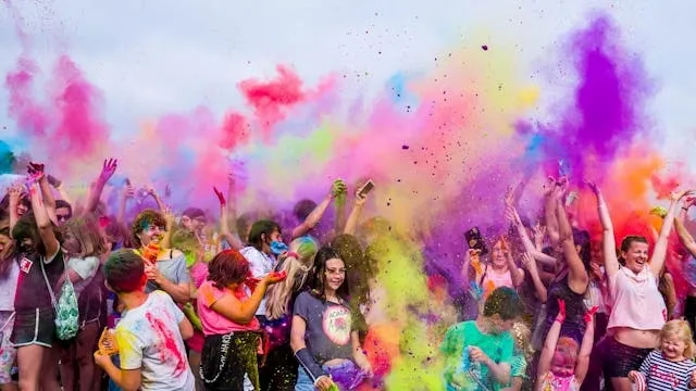 a group of people partying outdoors for how to loosen festival wristband
