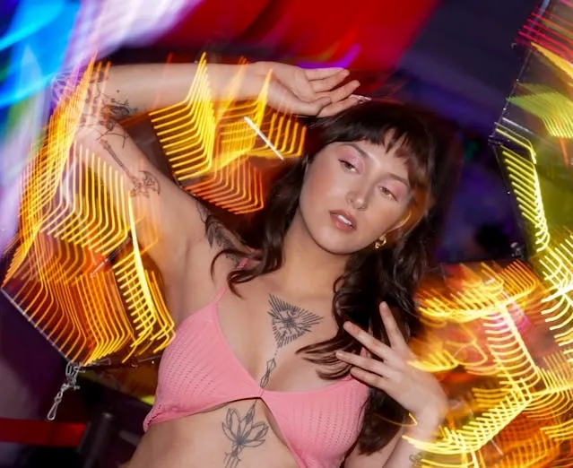 a tattooed woman for what is a flash tattoo