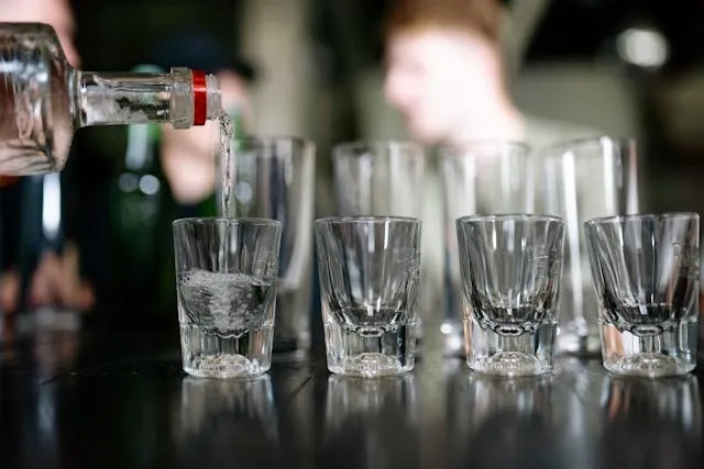 a row of shot glasses for shot glass measurement