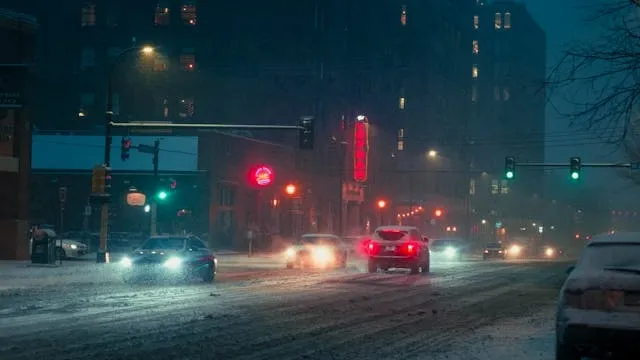 cars on a snowy road for can neon lights be in the cold