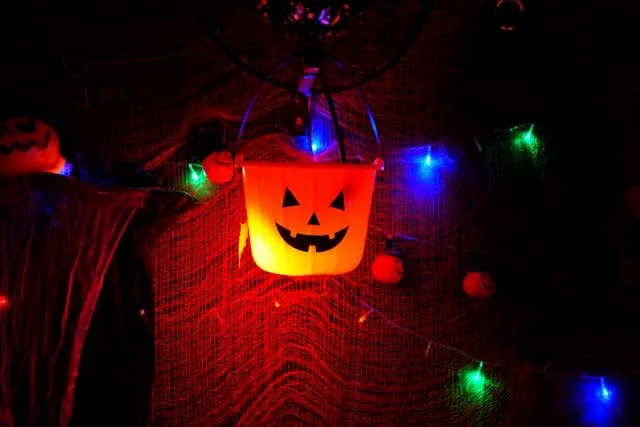 halloween-themed decorations with pumpkin lights for halloween table top decor