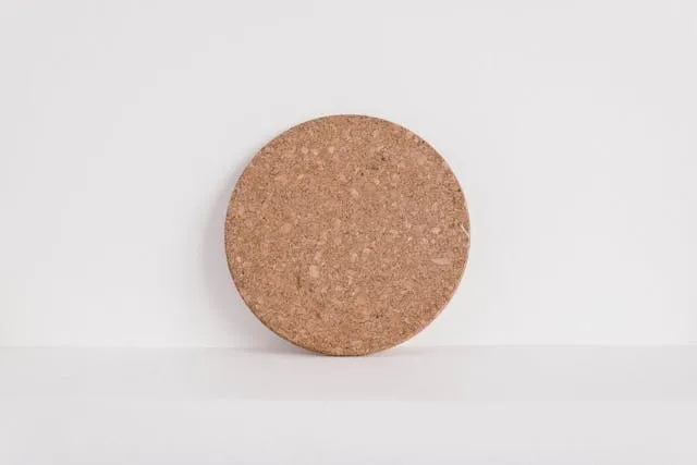 a plain cork coaster base for cork coaster craft ideas