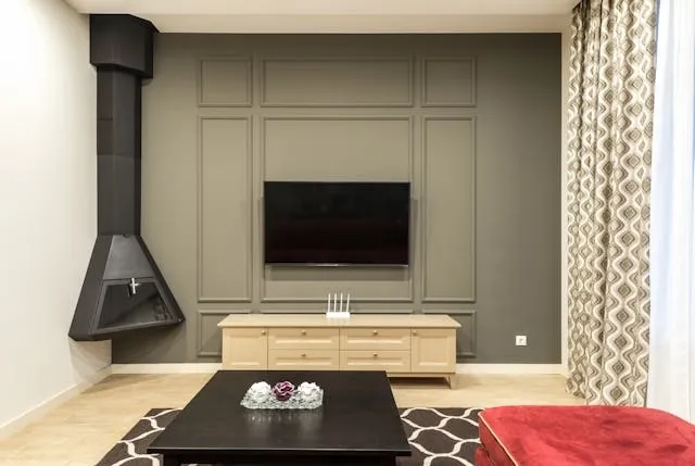 a lounge with a tv on the wall for tv wall ideas