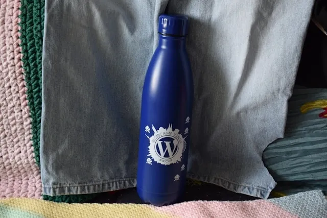 a white printed design on a blue tumbler for how to remove sublimation ink from tumbler