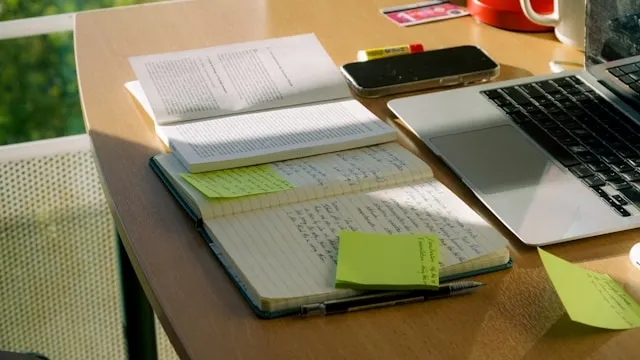 notes organized on a desk for what is a padfolio