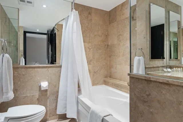 white towels in a small bathroom for how to display towels in bathroom