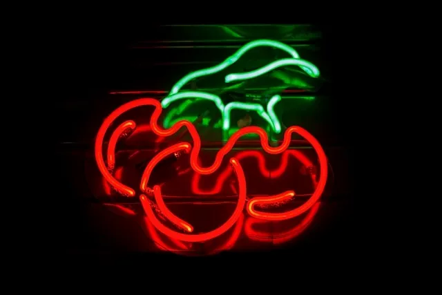 a neon sign in the shape of cherries for neon sign cut to shape vs cut to letter