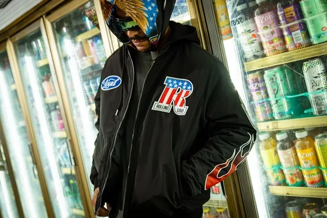a person wearing a military jacket with patches for how to style a military jacket
