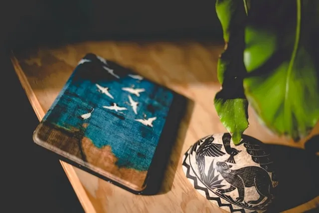 a square tile on a wood surface for how to make tile coasters waterproof