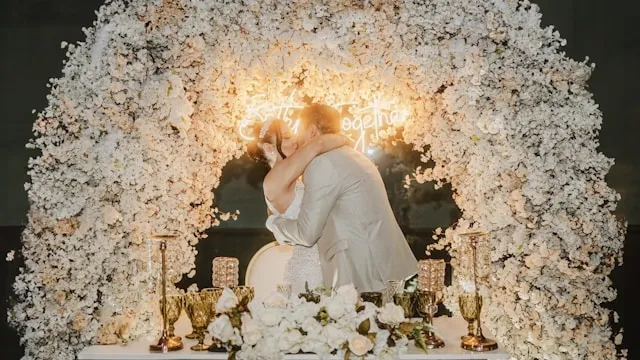 an elaborate wedding display for wedding neon sign backdrop