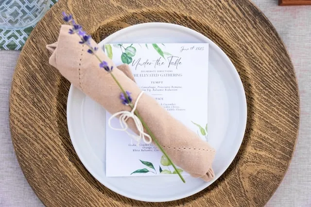 a formal place setting for how to wrap silverware in a napkin