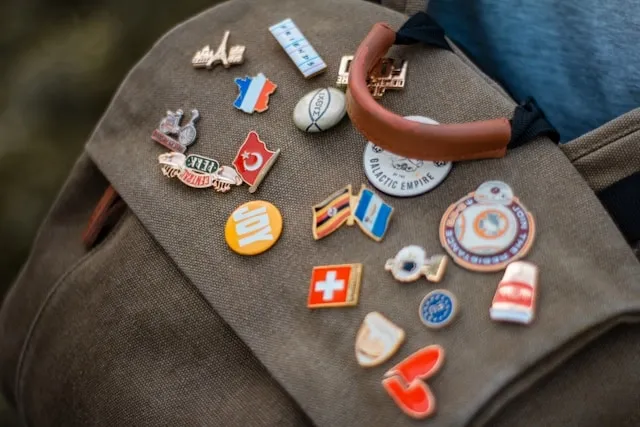 lapel pins on a bag for types of lapel pins