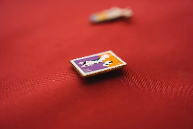 a square pin on red fabric for best lapel pins a square pin on red fabric for best lapel pins