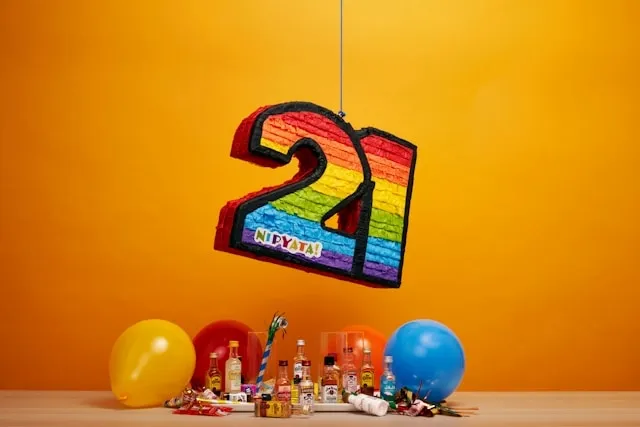a pinata in the shape of the number 21 for 21st birthday alcohol gift ideas