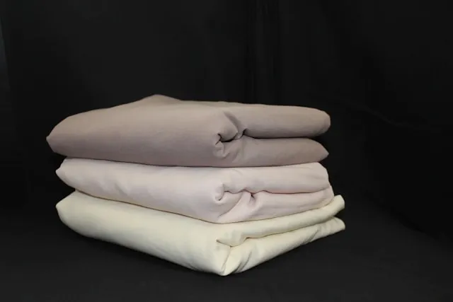 a small pile of folded blankets for how to store blankets a small pile of folded blankets for how to store blankets