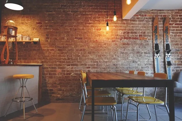 Rustic wall art and wooden signs decorating a bar interior