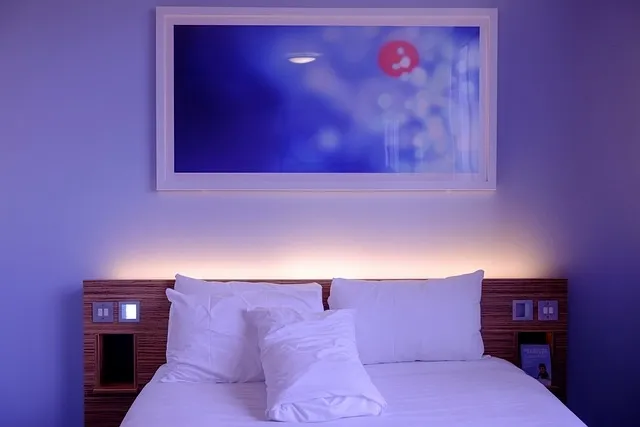 A pink neon light glowing in a modern bedroom