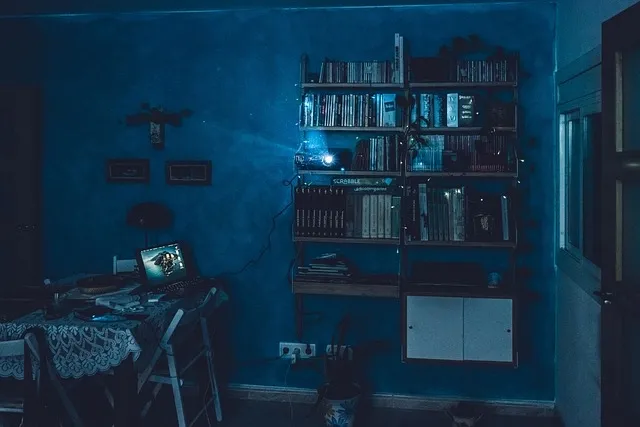 A modern home office illuminated with blue accent lighting