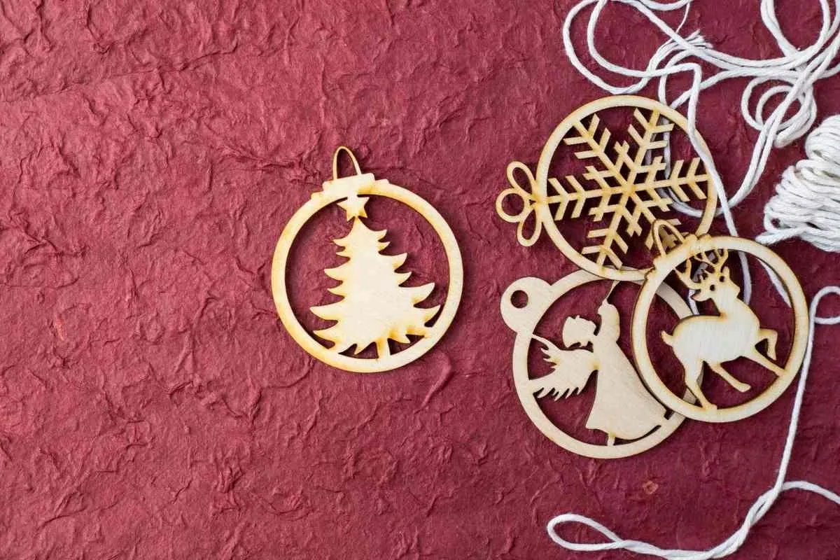 Laser-cut wooden Christmas tree, reindeer and snowflake motifs, popular themes for wooden Christmas coaster designs Laser-cut wooden Christmas tree, reindeer and snowflake motifs, popular themes for wooden Christmas coaster designs
