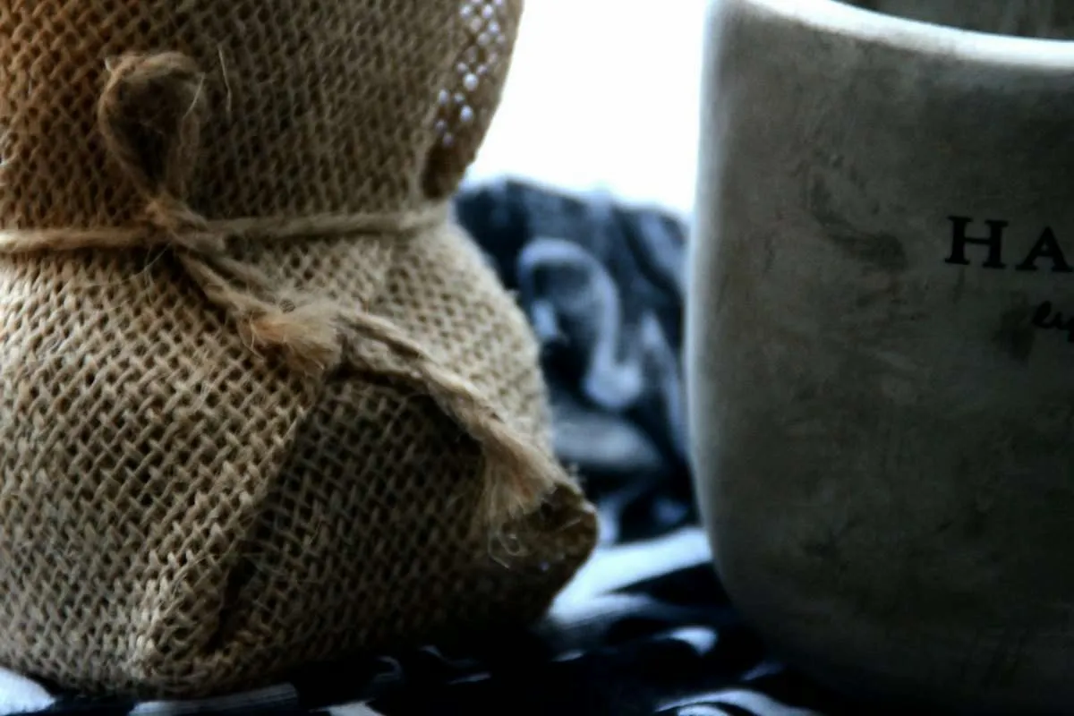 Close-up of coarse jute burlap weave showing the loose natural fibres that need low heat and a pressing cloth.jpg