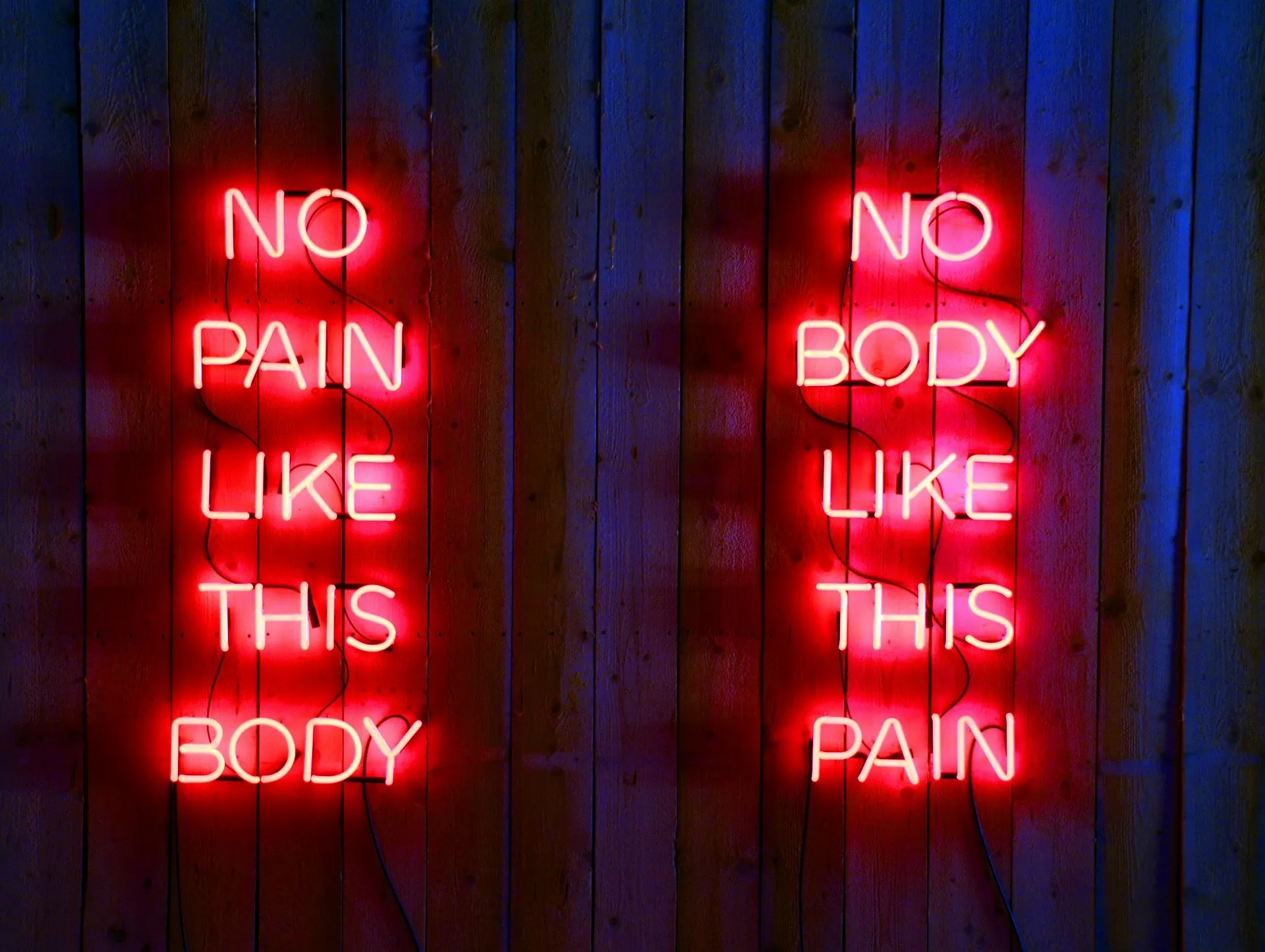 a red neon sign glowing against a dark wall for red neon sign aesthetic a red neon sign glowing against a dark wall for red neon sign aesthetic