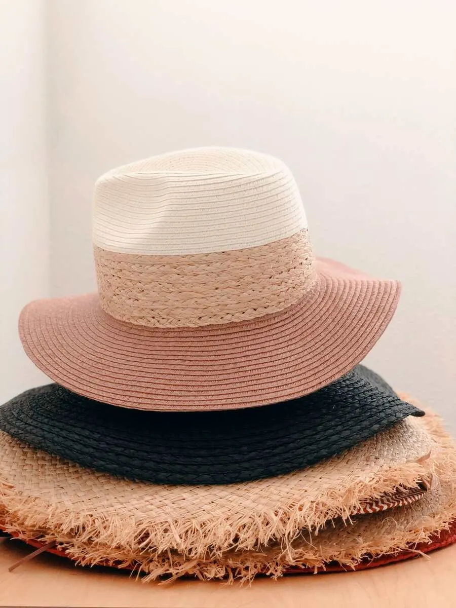 stacked straw hats stacked straw hats