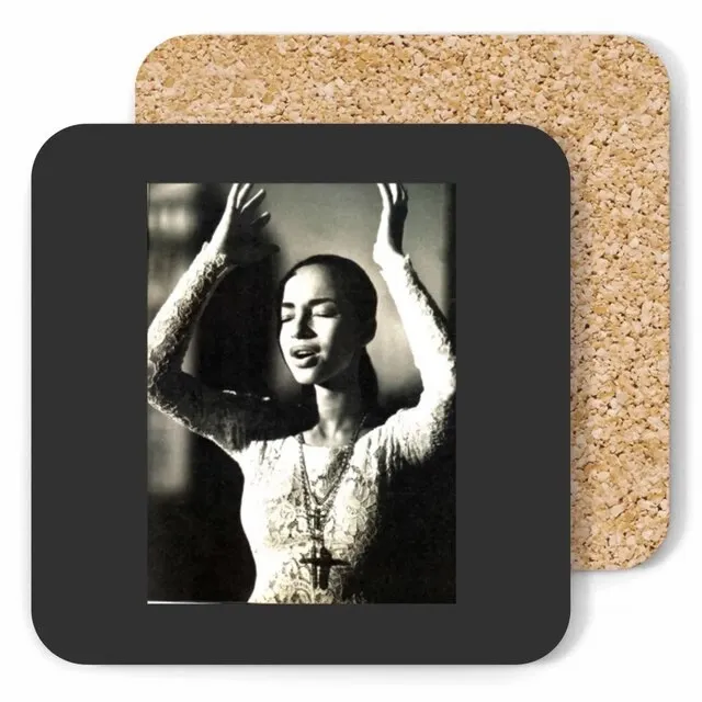 a coaster with a black and white photo of a woman with her hand in the air for diy photo coasters