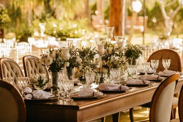 a table set for a wedding reception for how many people can sit at a 8 foot table