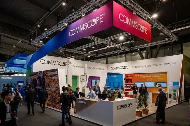 a professional trade show booth with branded signage for what is a trade show