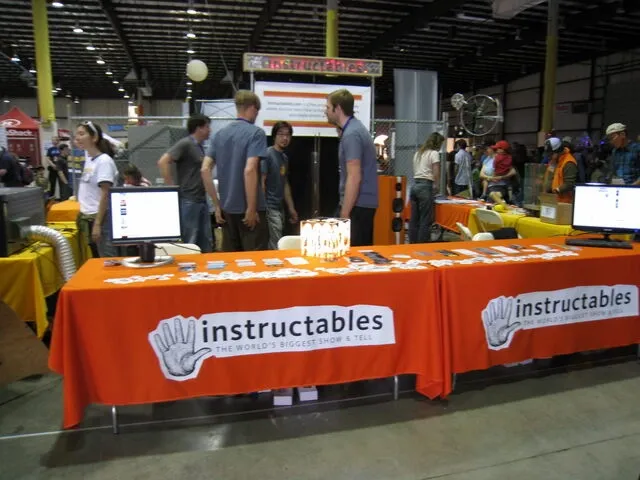 branded tablecloths in a trade show booth for trade show marketing