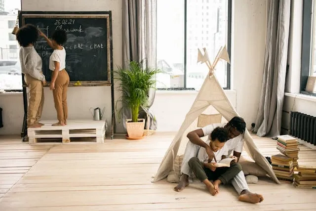 parents helping children with homework using wood pallets as decor for pallet coasters diy