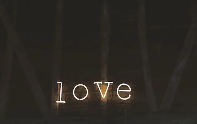 a neon sign that says love against a dark background for what size neon sign for wedding