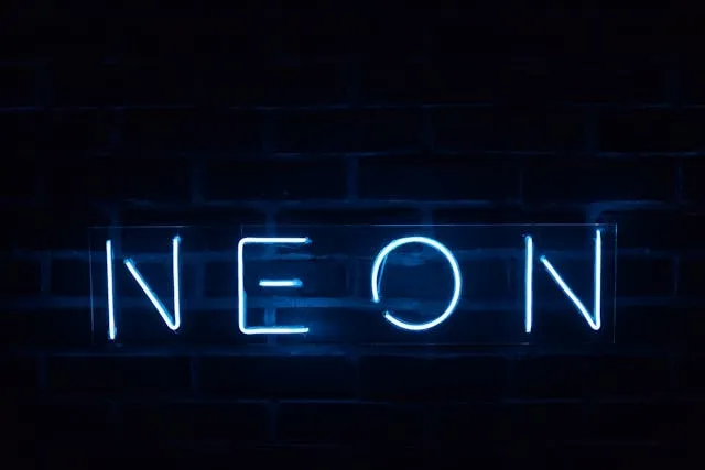 a blue neon sign that says neon against a dark background for electric blue neon blue aesthetic