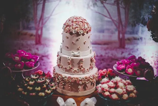 an elaborate wedding cake display for cake table decoration ideas