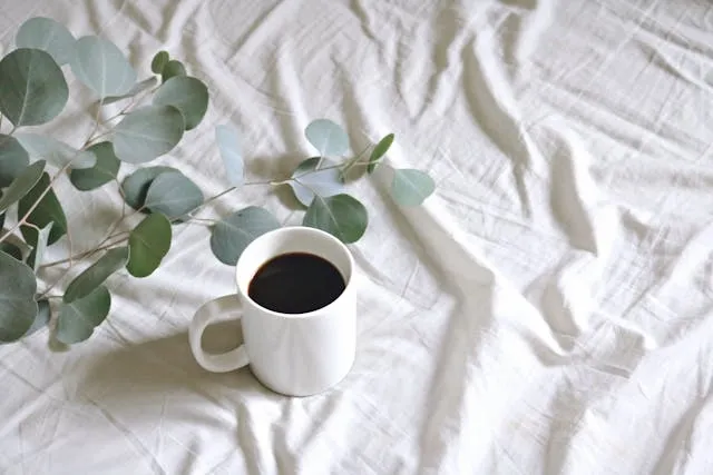 a mug of coffee on a linen tablecloth for how to wash linen tablecloth