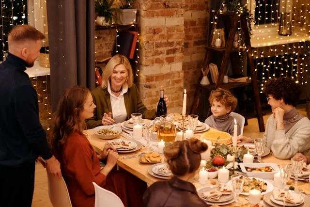 a family celebrating christmas dinner for elegant table setting ideas