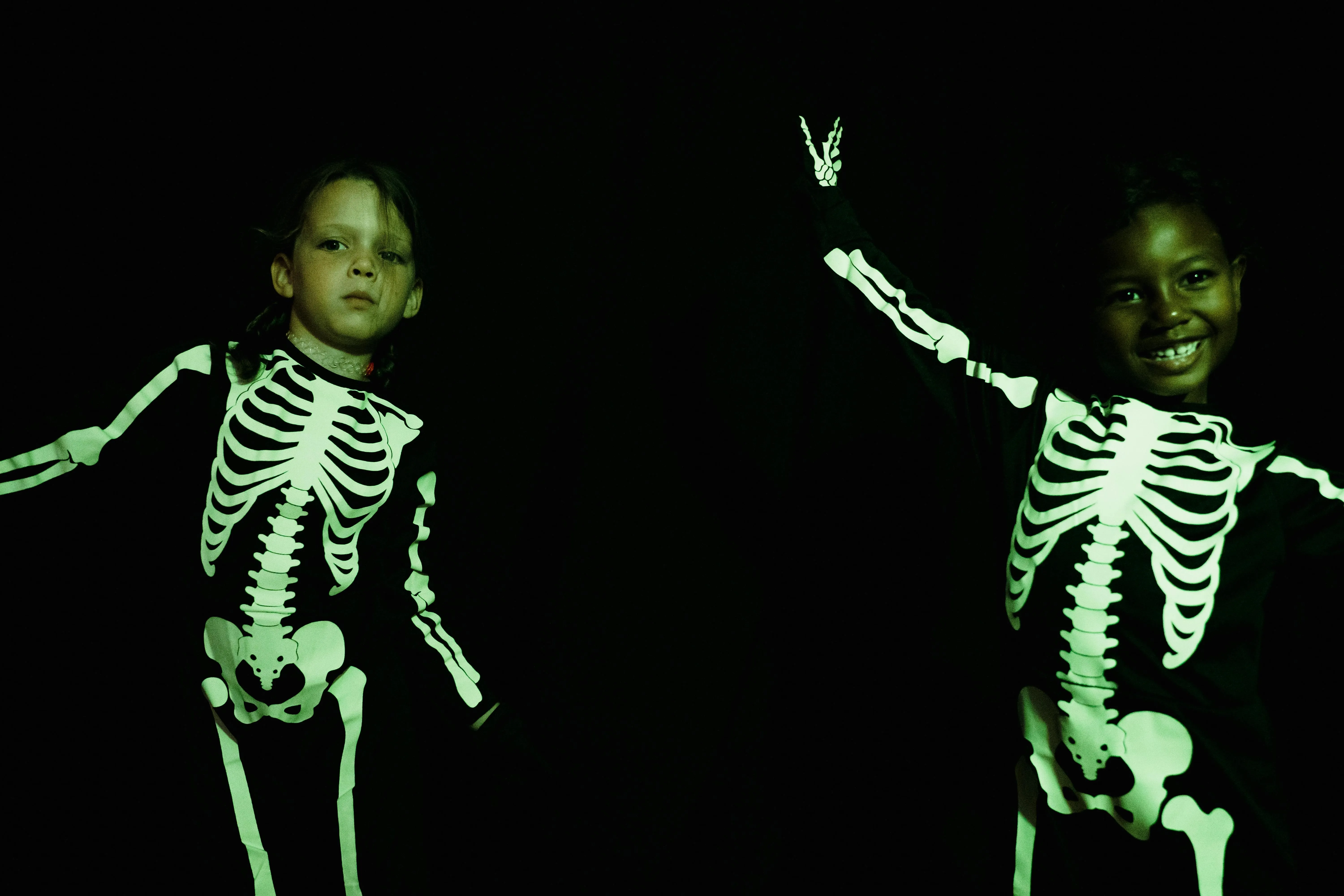 children wearing glow in the dark costumes for does neon glow in the dark