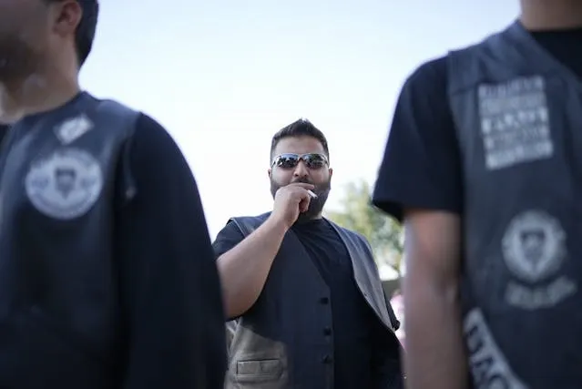 a biker smoking a cigarette for motorcycle patches to avoid