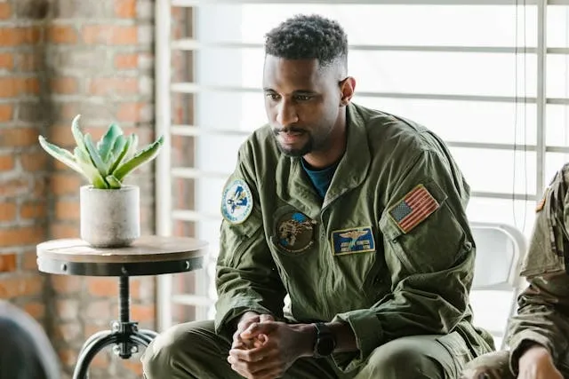 a soldier in full uniform displaying military patches for weird secret military patches