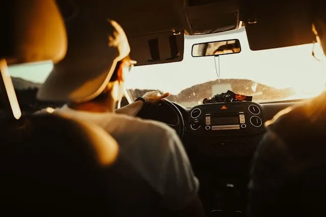 a man driving in sunlight for longest lasting car air freshener