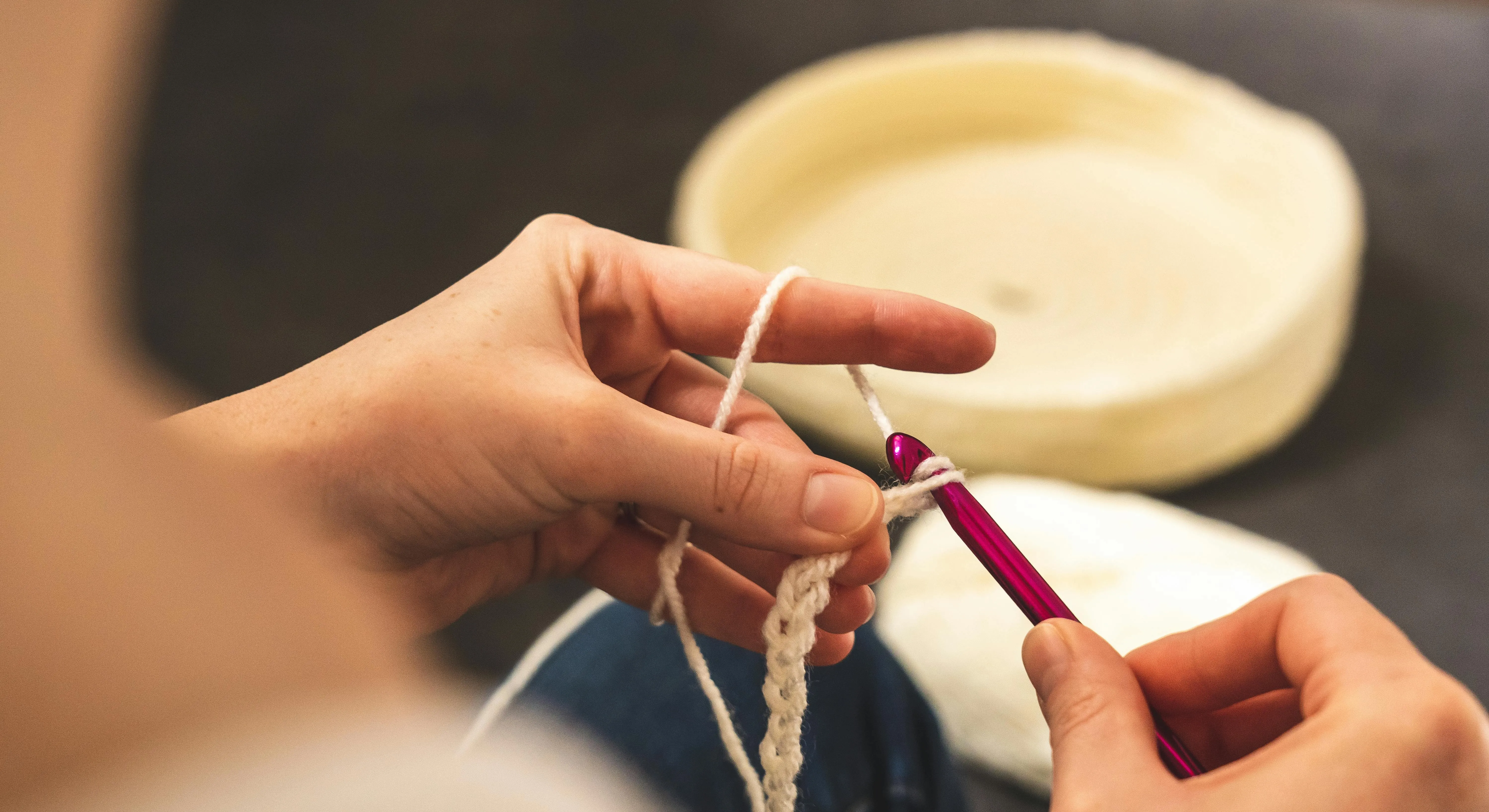 a person crocheting for mug rug ideas