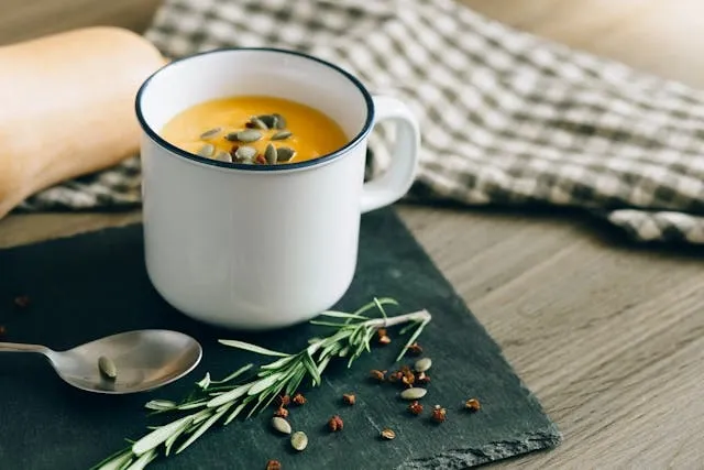 a mug of soup on a slate surface for laser engraved slate coasters