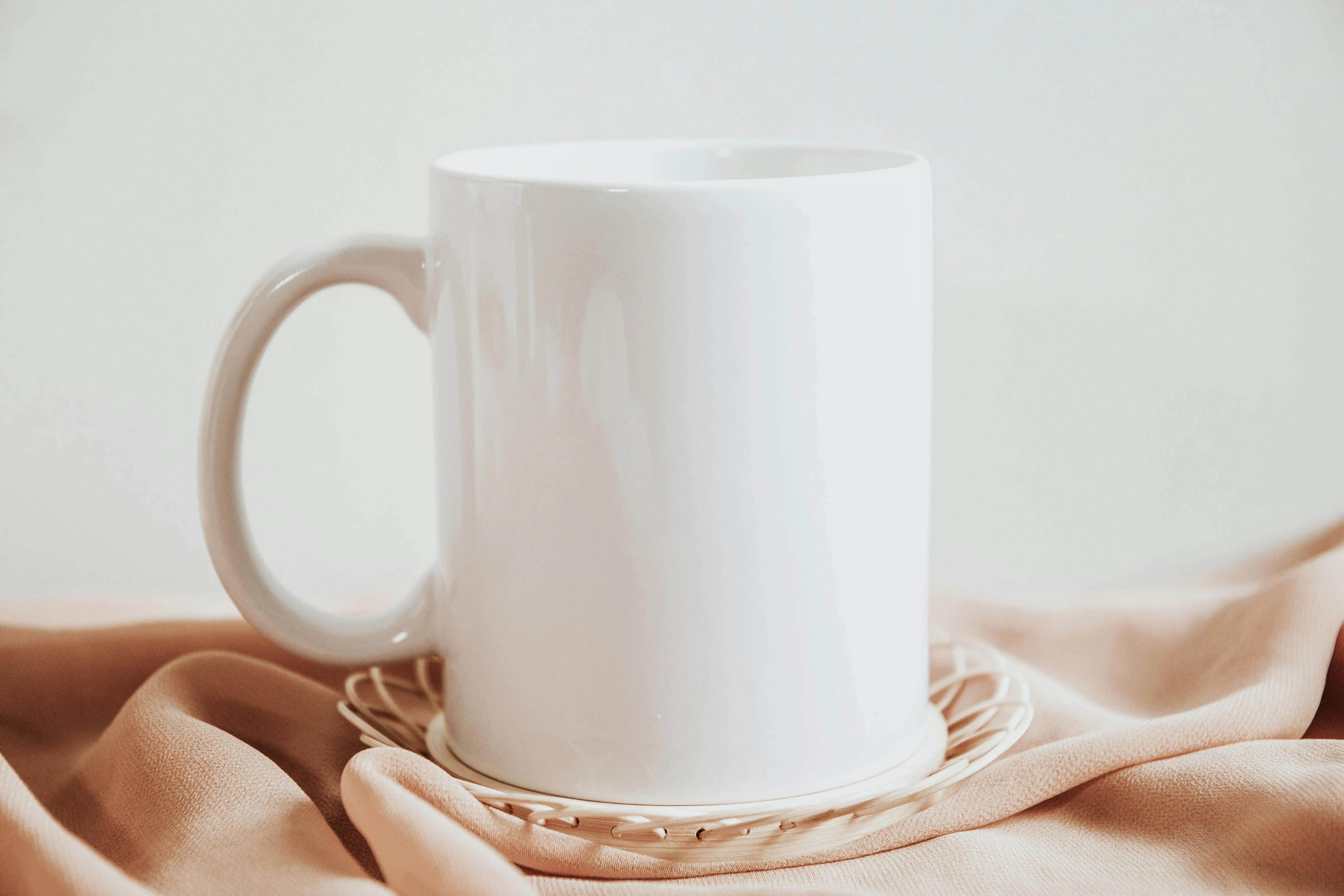 a mug on a piece of fabric for mug rug ideas