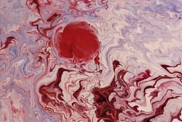 a photo of a red abstract design for alcohol ink coasters a photo of a red abstract design for alcohol ink coasters