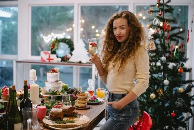 a woman beside a table and christmas tree for christmas coasters diy a woman beside a table and christmas tree for christmas coasters diy