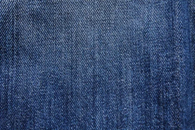 a close-up of denim fabric for how to use iron-on patches for holes a close-up of denim fabric for how to use iron-on patches for holes